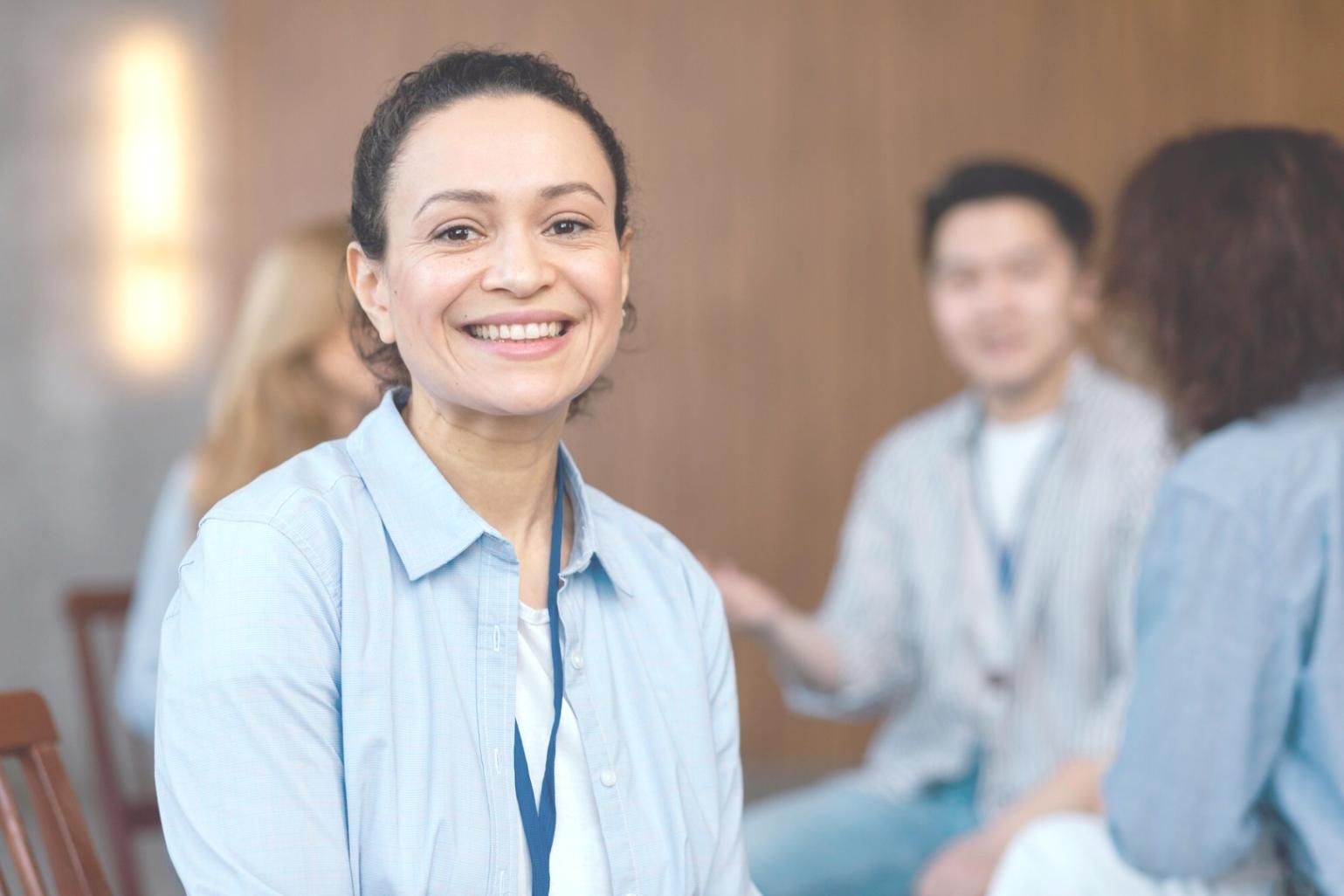 Interactive learning session with students analyzing financial charts and investment portfolios