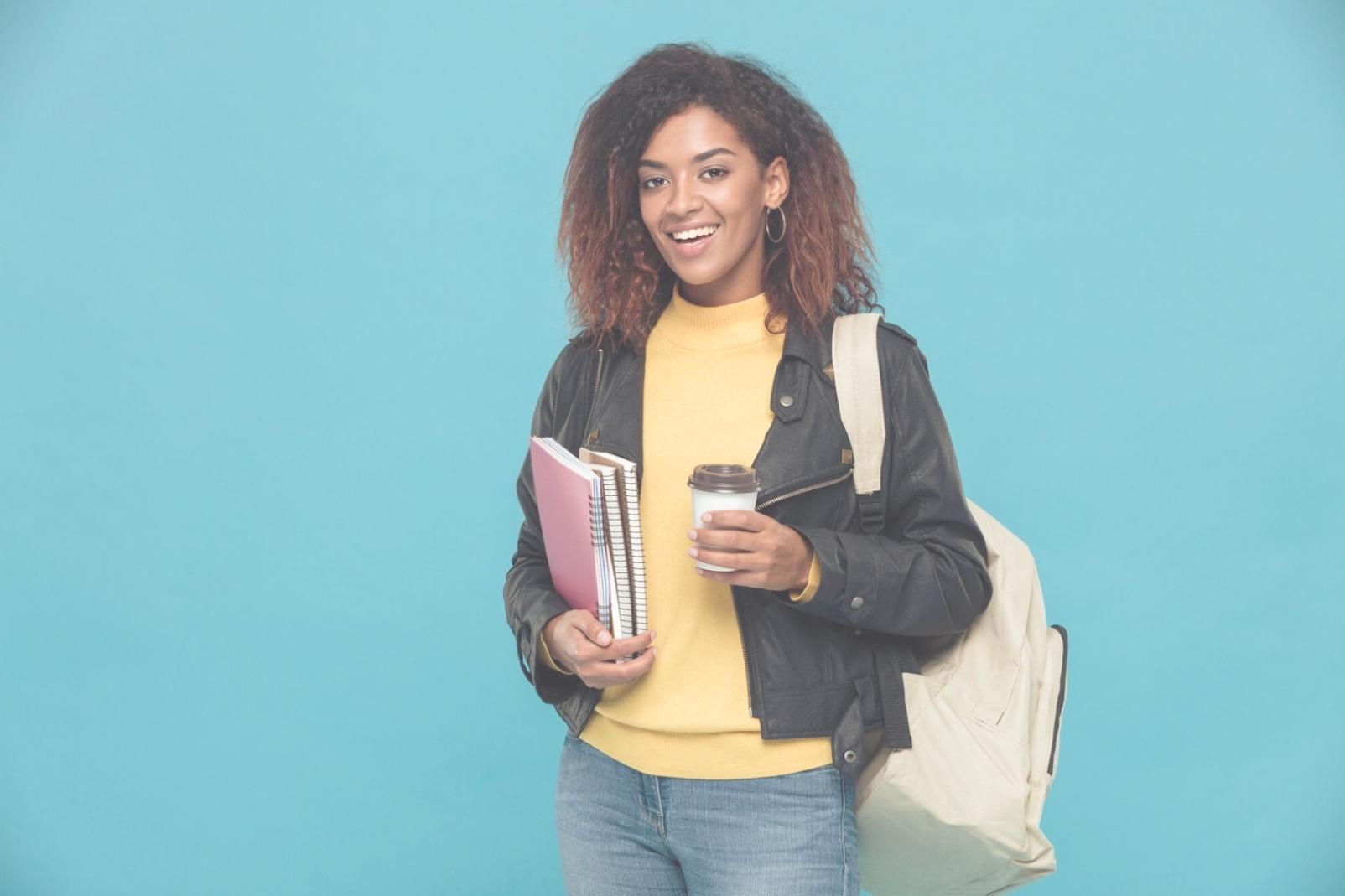 Students engaged in a financial education workshop discussing investment basics
